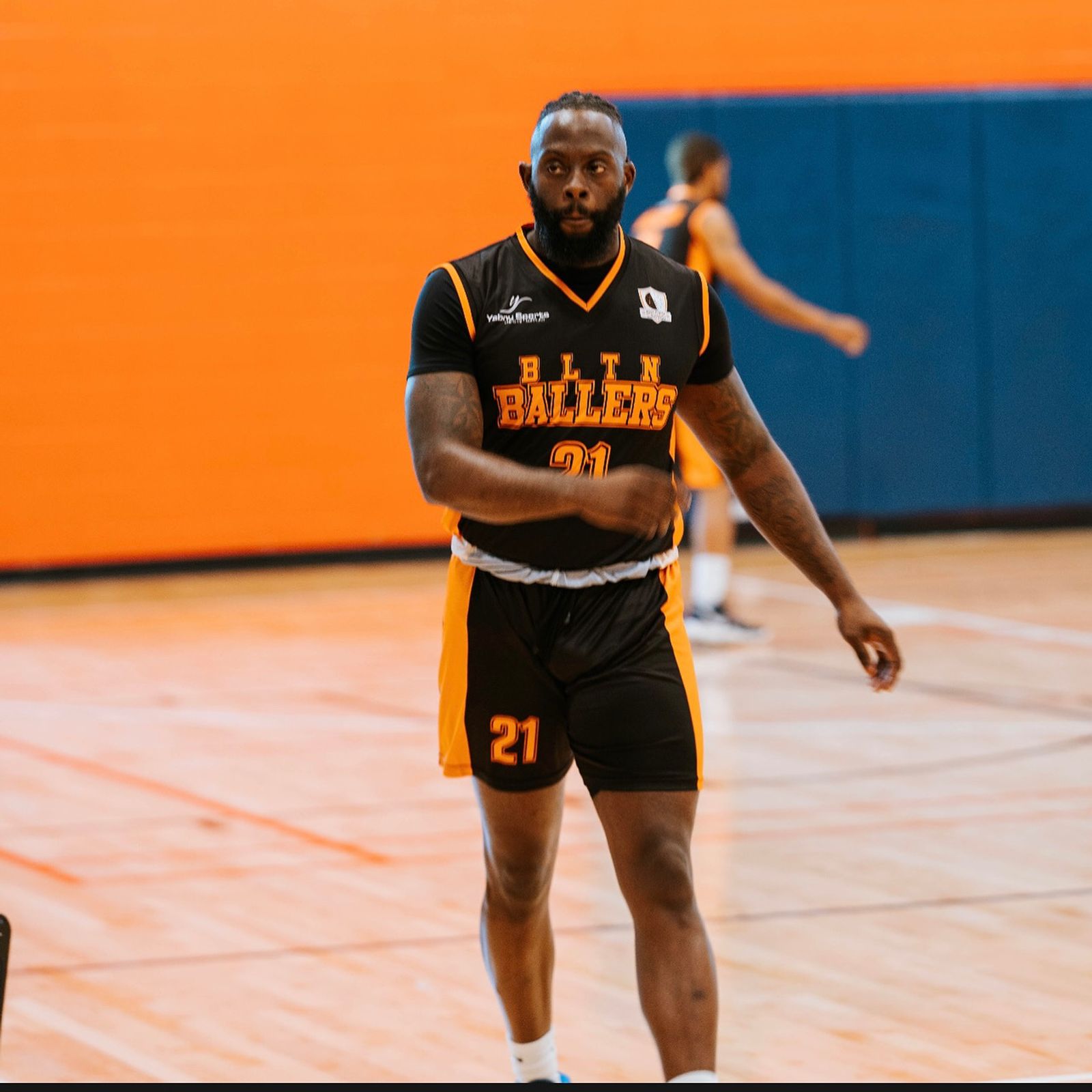 Coach Black in game action