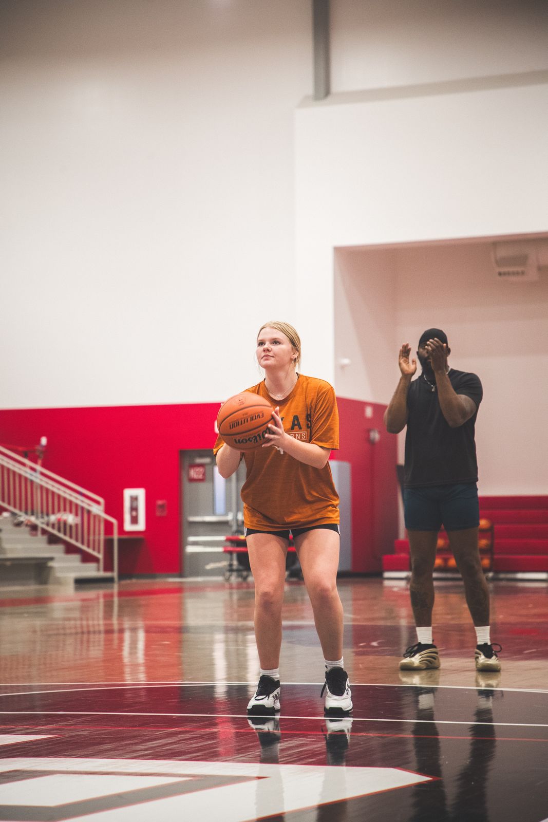 Shooting reps under Coach's eye