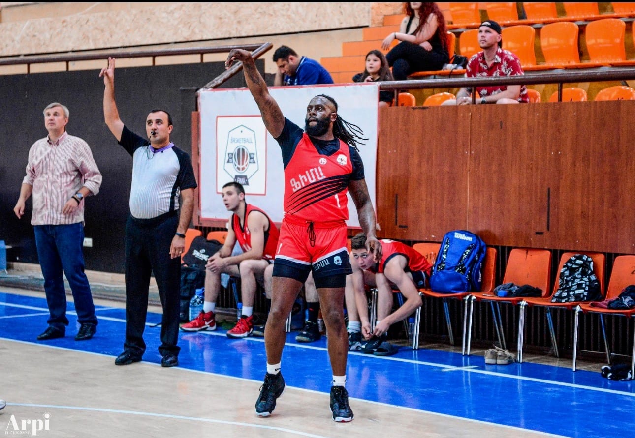Coach Black rising up for a jump shot as a pro