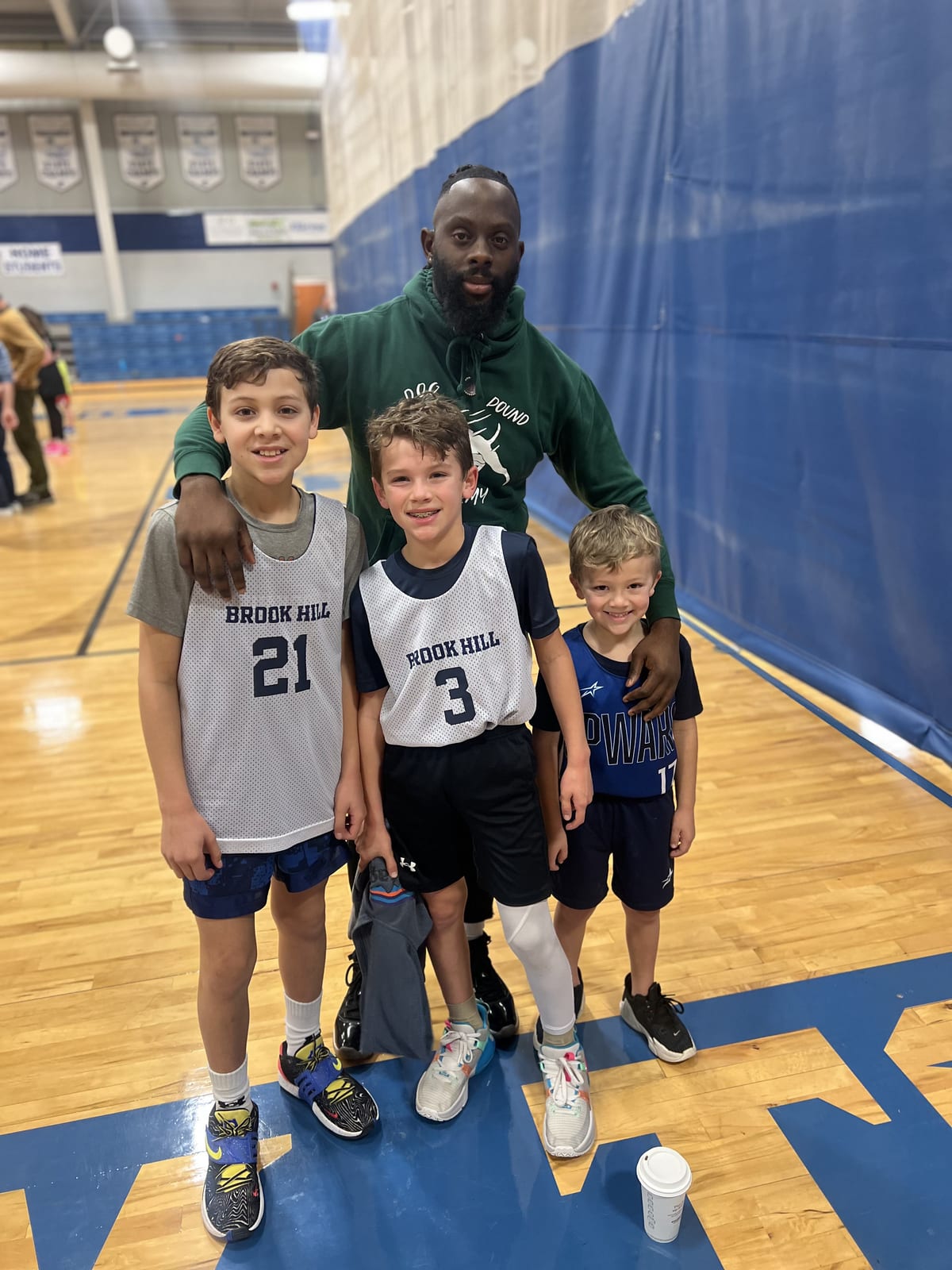 Coach Black with a group of his youngest players